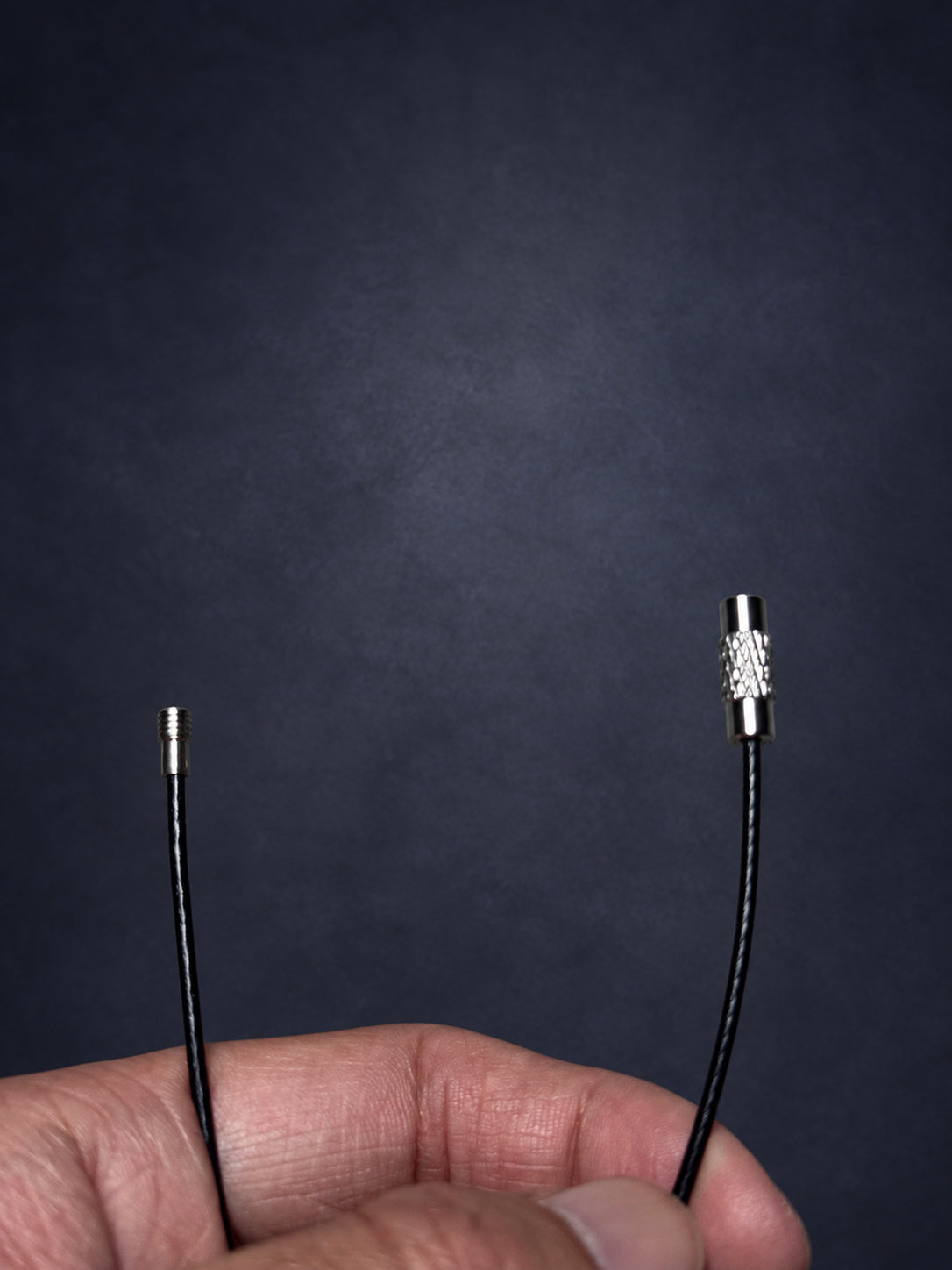 Open attachment loop showing the threaded connector ends for Thorn Bloom Talisman.